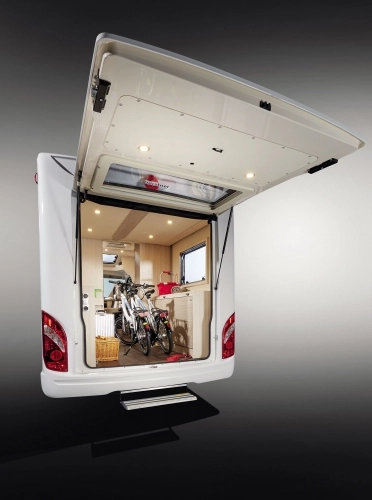 Wygodny załadunek i rozładunek jest możliwy dzięki szerokiej, tylnej klapie  z niskim progiem załadunku. - zdjęcie 3