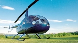 Robinson R22 – lekki śmigłowiec, którego lądowisko znajduje się na dachu kampera - zdjęcie 7