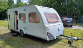                         Knaus Sudwind 450, Instalacja solarna, Truma ultraheat, akumulator - zdjęcie 23
                        